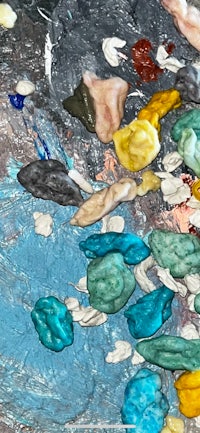 a close up of a palette with different colors of paint