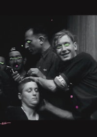 a black and white photo of a group of people with green eyes